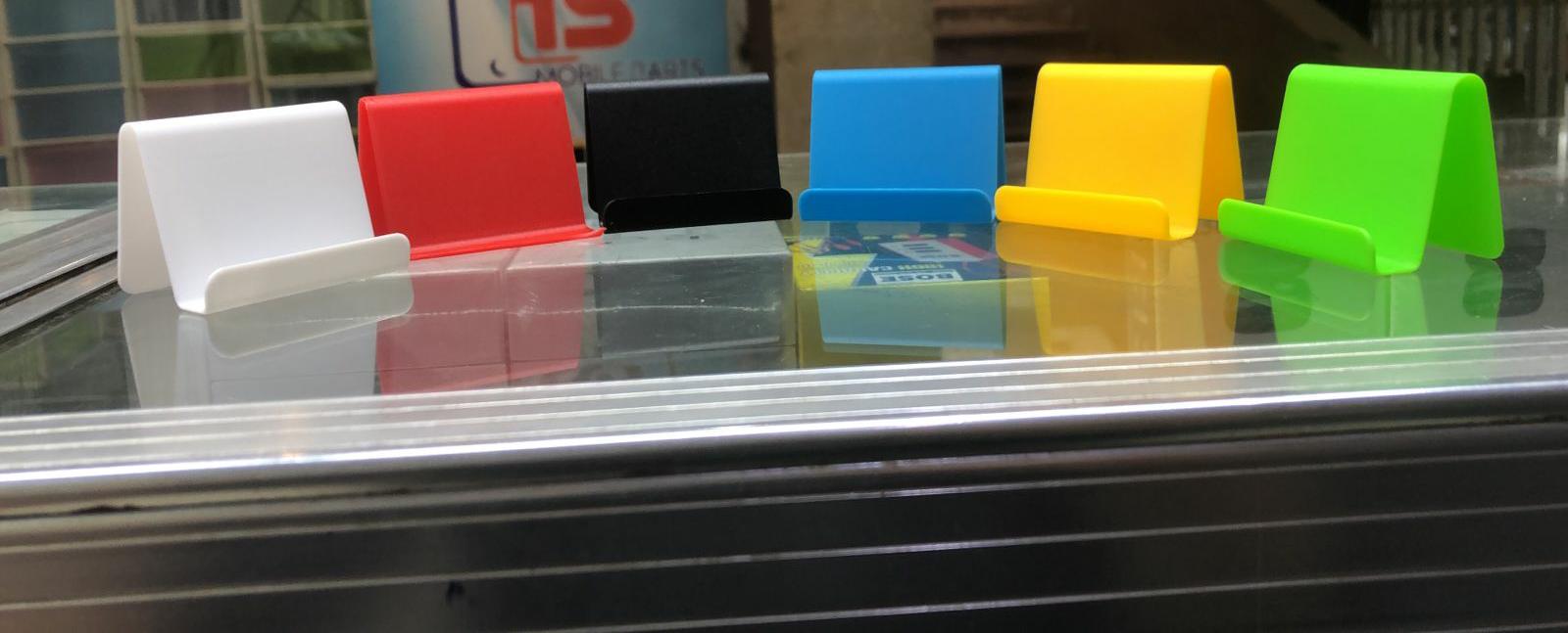 1Pc Cell Phone Stand For Desk (Random Colour) buy online in Pakistan