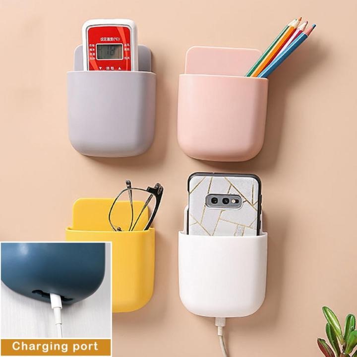 1 Pcs U Shape Wall Mounted Mobile And Remote Holder | Wall Mounted Storage Case for Remote, Toothbrush, Mobile Phone Plug Holder | Multifunctional Storage Holder (random color) buy online in Pakistan