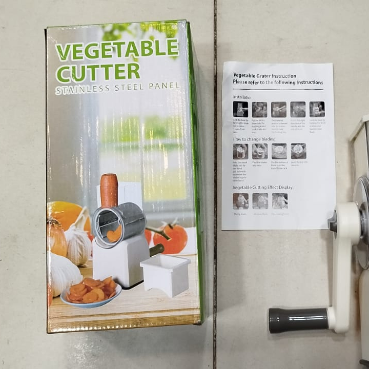 Vegetable Cutter Stainless Steel | Manual Vegetable Cutter Slicer & Grater | Multi-Functional Kitchen Gadget ( Random Color ) buy online in Pakistan