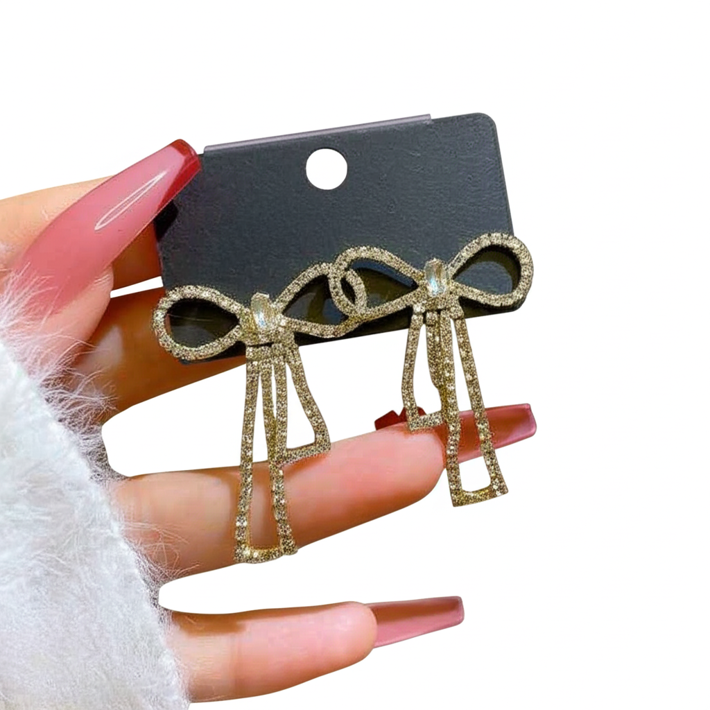 PQT-985 Touch Of Glamour To Your Look With These Bow Shape Zircon Korean Earrings – Color Golden buy online in Pakistan