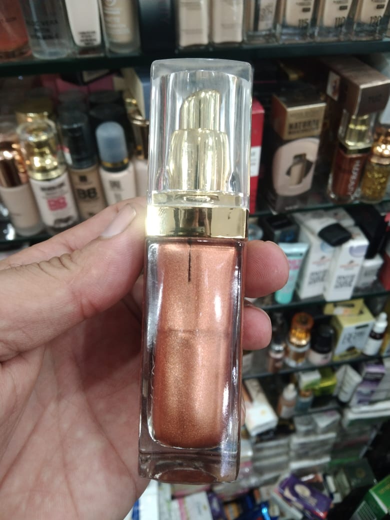 Huda Beauty N.Y.M.P.H. All Over Body Highlighter – Liquid Illuminator for Face, Body & Legs – Water-Based, Long-Last...