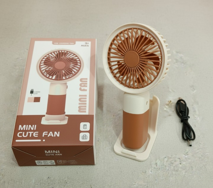 Mini Cute Fan – Portable USB Rechargeable Handheld Cooling Fan for Kids & Adults, Stand/Base Included (Random Color) buy online in Pakistan