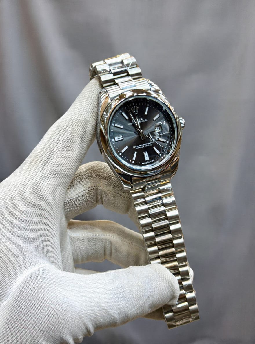 Rolex Brand Oyster Perpetual Watch With Stainless Steel Chain - Quality Timepiece Featuring Date Function And Radium Details For Enhanced Visibility buy online in Pakistan
