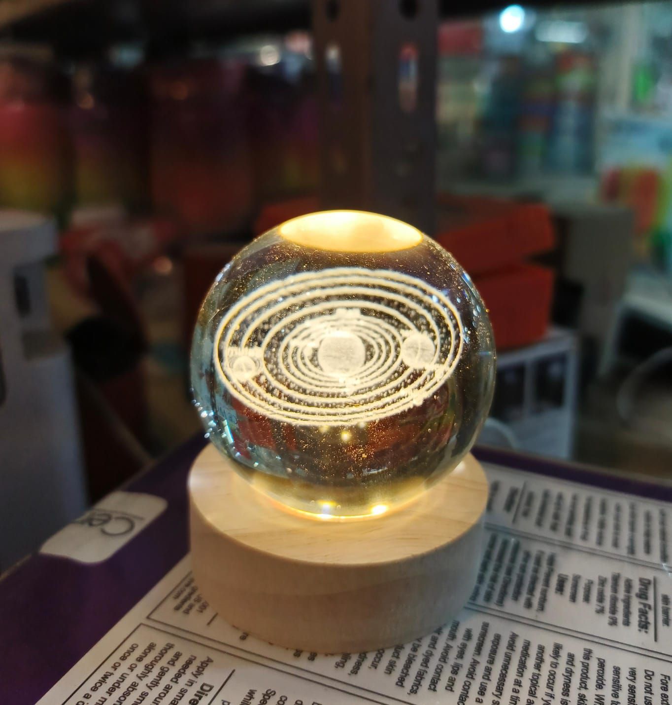 Beautiful 3D Crystal Ball LED Table Lamp With Laser Engraved Solar System Or Galaxy Design On Wooden Base (Random Design) thumbnail 2