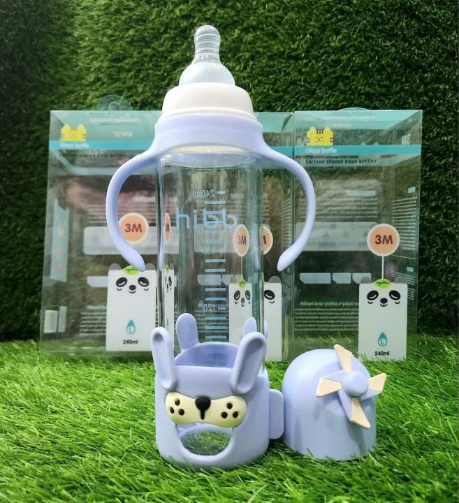 Premium 240ml Baby Feeder Glass Bottle with Handles | Anti-Colic Regular Nipple & Cute Cartoon Protective Silicone Sleeve | 4 Attractive Colors (3M+)